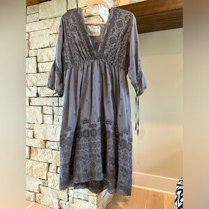 100% Silk eyelet dress new without tags. Comes with silk slip. Gorgeous!